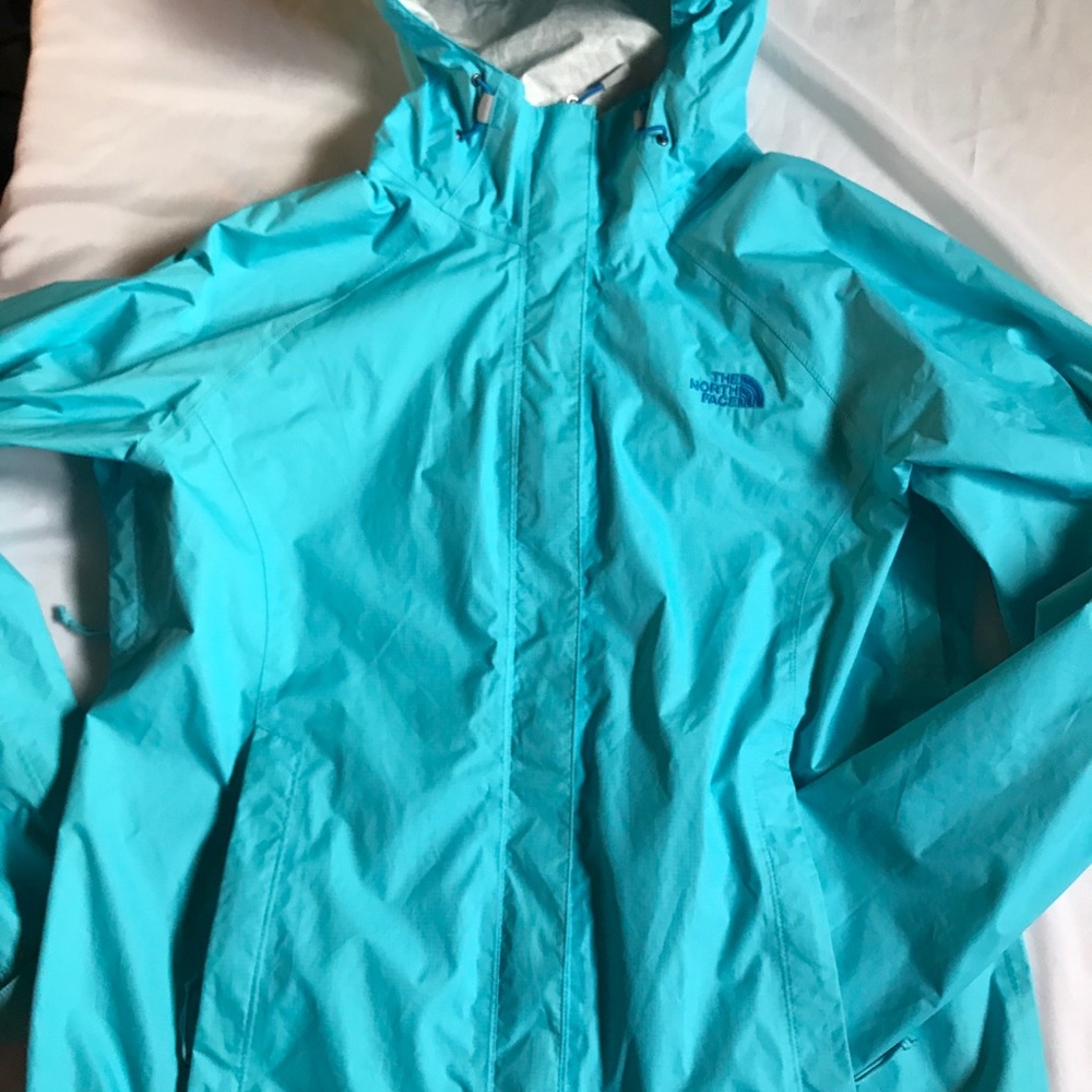 The North Face rain coat. Light Blue